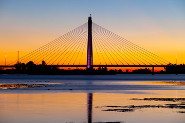 Fototapeta na wymiar Bridge over the Guadiana River at dusk