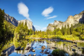  Scenic view of Yosemite Valley with El Capitan rock formation reflected in river, California, USA. © MaciejBledowski