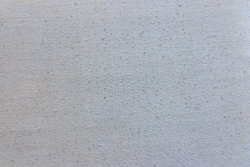Texture of matted fabric with pellets, close-up background