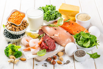 Selection of animal and plant protein sources - fish, meat, beans, cheese, eggs, nuts and seeds,...