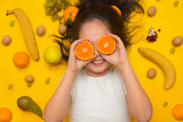 child with fruit