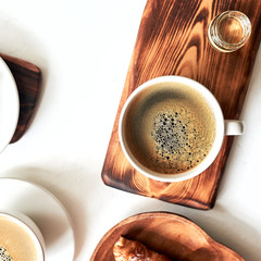 breakfast pattern, croissant, coffee, honey, cinnamon sticks, nuts, sugar. Good morning concept.