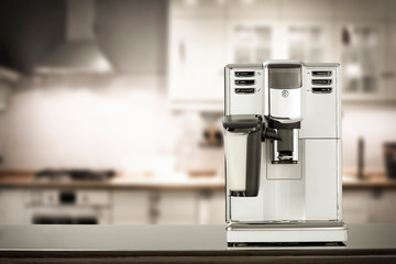 Coffee machine and blurred kitchen interior. 