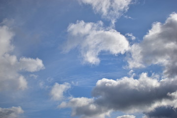 clouds against a blue sky