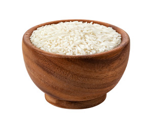 Rice in wooden bowl isolated on white background