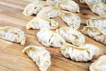 Gyoza or dumplings snack with soy sauce.