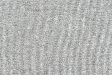 White natural texture of knitted wool textile material background. White cotton fabric woven canvas texture