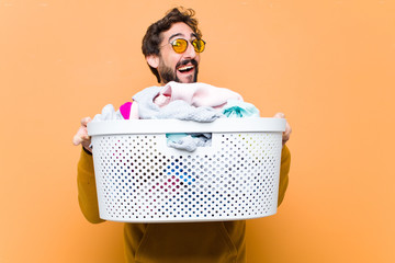 young crazy cool man with the laundry basket