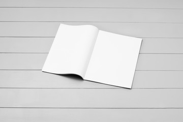 Mock-up magazine, newspaper or catalog on gray background. Blank page