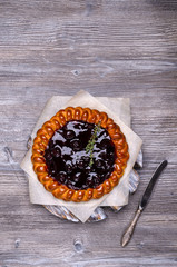 Open pie with berry jam