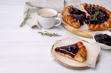 Open pie with berry jam