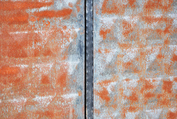 ,The rusty galvanized iron, The rusty corrugated iron. as a wall and fence. Background.
