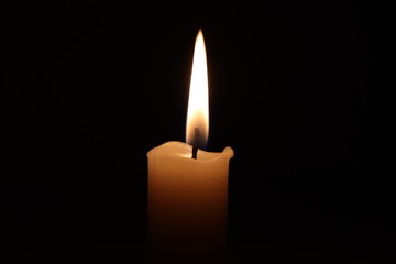 Candle black background of mourning funeral  moment of silence