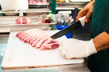 woman cutting vegetables in the kitchen