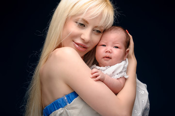 Blonde woman and a small child..