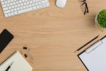 Top view Wood office desk table. Flat lay Workspace