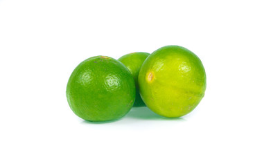 green lemon isolated on white