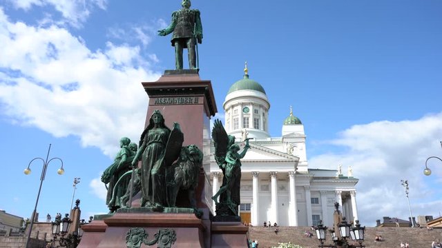HELSINKI, FINLAND - JULY 27, 2019: Beautiful Architecture of Helsinki Cathedral and monument to Russian Emperor Alexander II in the Old Town of Helsinki, Finland on the Senate Square.