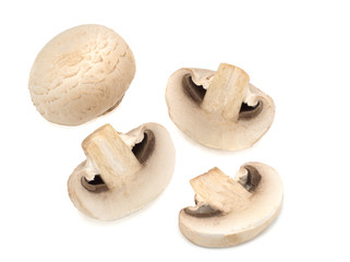 Champignon and its halfs isolated on a white background