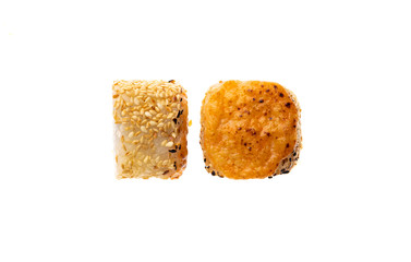 sushi and rolls with different toppings in two pieces close-up on a white background