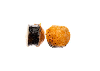 sushi and rolls with different toppings in two pieces close-up on a white background