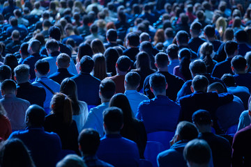 Audience listens to the lecturer at the conference