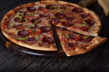 pizza with tomatoes and olives