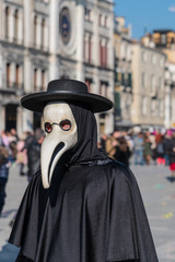 Fototapeta premium Between masks, Gondolas and art. Venice. Italy