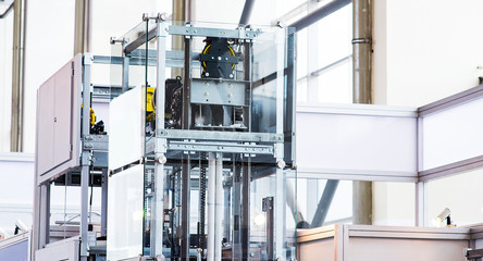 Elevator Installation, Lift Technician Installing a Modern Elevator