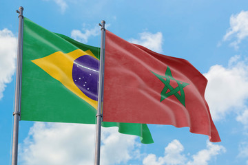 Morocco and Brazil flags waving in the wind against white cloudy blue sky together. Diplomacy concept, international relations.