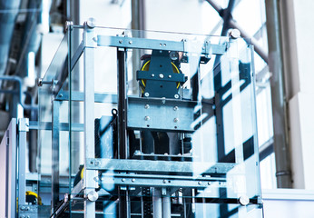 Elevator Installation, Lift Technician Installing a Modern Elevator