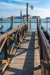 Fototapeta premium Between masks, Gondolas and art. Venice. Italy