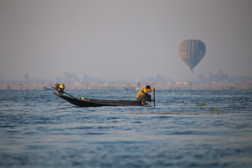 The famous fishermen of Inle Lake, Myanma, working at sunrise