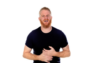 Red haired man with long beard with stomachache
