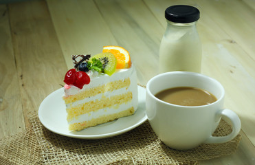 cake and coffee on wood table