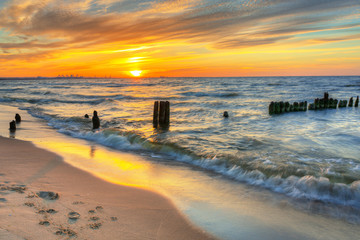 Beautiful beach of the Baltic Sea at sunset in Gdansk, Poland © Patryk Kosmider