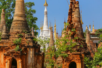 Semi dilapidated and restoted stupas of ancient pagodas in Myanmar