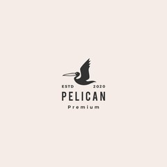 Obraz premium pelican gulf bird coast beach logo vector icon illustration hipster vintage retro