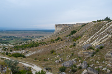 Fototapeta na wymiar White rock. Crimea. High white rock and its surroundings. General view of the mountain.