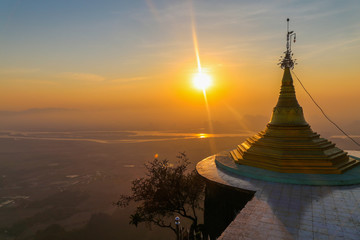 Sunset with mountains in the background the stupa of Myanmar