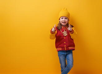 Kid on bright color background.