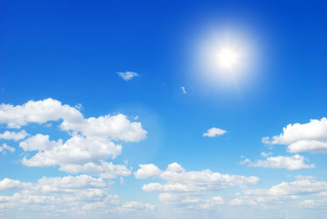 blue sky background with tiny clouds