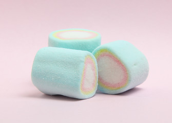 colorful marshmallows candy  on pink background