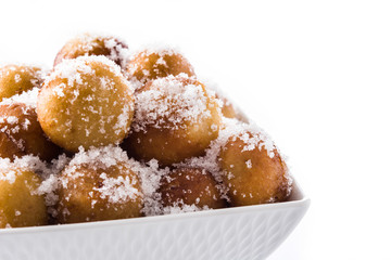 Carnival fritters or buñuelos de viento for holy week isolated on white background