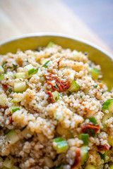 Healthy Salad with Barley, Sun Dried Tomatoes, Cucumber, Lemon Juice, Olive Oil and Herbs