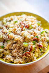 Healthy Salad with Barley, Sun Dried Tomatoes, Cucumber, Lemon Juice, Olive Oil and Herbs