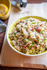 Healthy Salad with Barley, Sun Dried Tomatoes, Cucumber, Lemon Juice, Olive Oil and Herbs