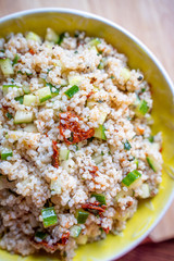 Healthy Salad with Barley, Sun Dried Tomatoes, Cucumber, Lemon Juice, Olive Oil and Herbs