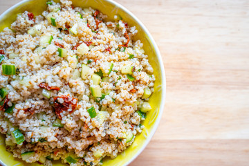 Healthy Salad with Barley, Sun Dried Tomatoes, Cucumber, Lemon Juice, Olive Oil and Herbs
