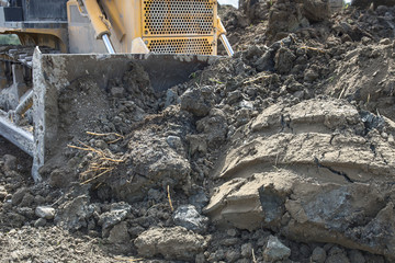 soil movement with a modern bulldozer in preparation for the construction site